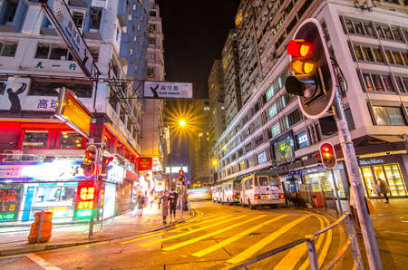 HONG KONG - DECEMBER 7: Neon lights on Tsim Sha Tsui street on December, 7, 2016. Tsim Sha Tsui street is a very popular shopping place in Hong Kong.のeditorial素材
