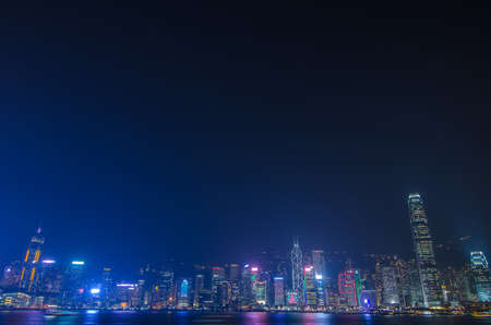 HONG KONG, CHINA - DEC 8, 2016: Hong Kong cityscape waterfront over Victoria harbor, to night on December 8, 2016 in Hong Kong, Chinaのeditorial素材
