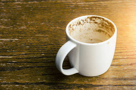 Cup of delicious coffee with exhaustedの写真素材