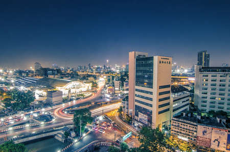 BANGKOK - June 20,2017 : a view over the big asian city of Bangkok , Thailand at night time when the tall skyscrapers are illuminated and street traffic on june 20,2017のeditorial素材