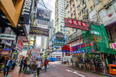 HONG KONG - Dec 11: Mong kok at morning on APR 5, 2016 in Hong Kong. Mong kok is characterized by a mixture of old and new multi-story buildings, with shops and restaurants at street level.のeditorial素材
