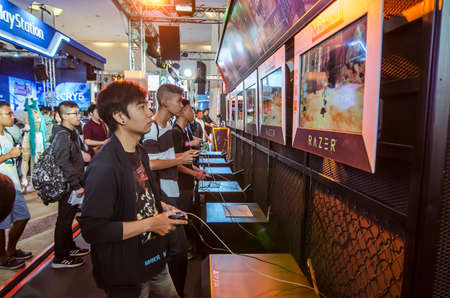 THAILAND - 4 November 2017: Boots games by PlayStation 4. Mounted displays at Thailand game show big festival 2017 in ROYAL PARAGON HALL, Bangkok Thailand.のeditorial素材