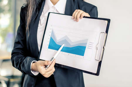 business women conference presentation with team training flipchart officeの写真素材