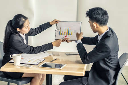 business women conference presentation with team training flipchart officeの写真素材