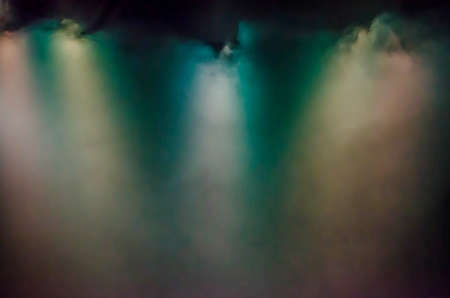 Abstract stage lights with smoky effect on floor background.の写真素材