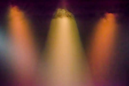 Abstract stage lights with smoky effect on floor background.の写真素材