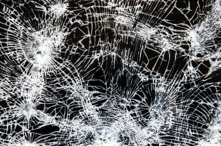 Mobile modern touch screen smartphone ,Cracked glass of broken lcd TV display screenの写真素材