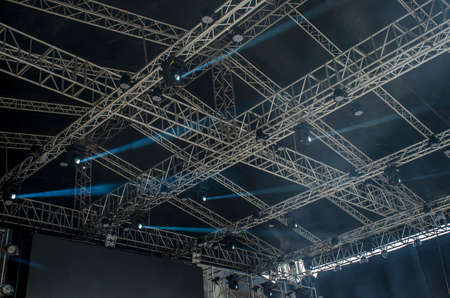 Concert stage spot lighting rigging structure for a live musical theatre event led lighting devices under roof.の写真素材