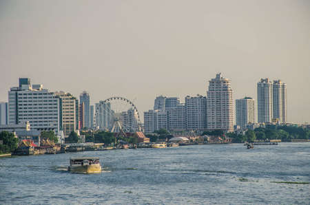 BANGKOK - May 13, 2018: Bangkok Cityscape, business and hotel district with high buildings on Chaophraya river at evening on May 13 , 2017 in Bangkok, Thailand.のeditorial素材