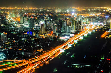 BANGKOK, THAILAND - JUNE 21: Photo  at night on Baiyoke Tower 2 is a beautiful Aerial view highway...