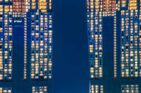 Close - up of a highly-detailed night windows pattern of modern metropolis.