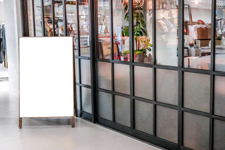 blank poster display mockup template,empty billboard display in front of restaurant.