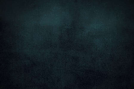 abstract green background or black background with lots of rough distressed vintage grunge background texture, black border edges with center spotlight text area for ads or other graphic art imagesの写真素材