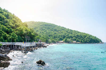 THAILAND, KOH LARN PATTAYA Oct 21, 2019 : Wooden bridge walkway on beach sea summer day at Koh Larn Island picturesque scenery in Pattaya Thailandのeditorial素材