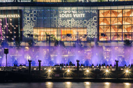 BANGKOK, THAILAND-JANUARY 31, 2019 : The colourful of multimedia water feature fountain dancing show at river park of THE ICONSIAM Department Store, The new biggest landmarks and luxury shopping mallのeditorial素材