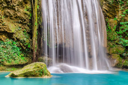 Closeup fragment of a powerful waterfall at Erawan waterfall, beautiful waterfall in deep forest,...