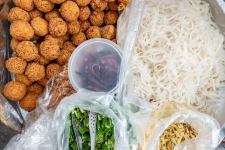 Yum Nham is a famous food with spicy flavor , Isaan style Thai food, Thai food on the street is popular and sell wellの写真素材