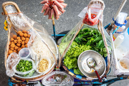 Yum Nham is a famous food with spicy flavor , Isaan style Thai food, Thai food on the street is popular and sell wellの写真素材