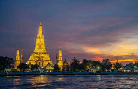 Beautiful view of Wat Arun Temple at sunset in bangkok Thailand. Wat Arun is a Buddhist temple in Bangkok Yai district of Bangkok, Thailand, Wat Arun is among the best known of Thailand's landmarksの写真素材