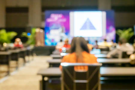 Blur of business Conference and Presentation in the conference hall, Abstract blurred people in seminar room, education conceptの写真素材