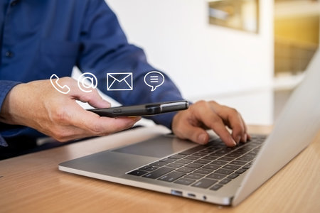 Hotline service, Customer support hotline Contact us people connection. Businessman using Smart Phone with the email, call phone, address, Chat message iconsの写真素材
