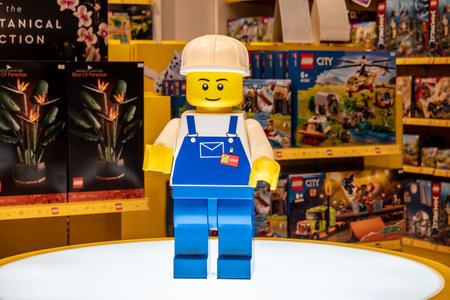 Lego minifigure statue on display at the Lego Store in shopping mall, Lego is a line of plastic construction toys that are manufactured by The Lego Group company in Denmark.のeditorial素材