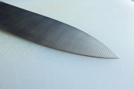 Knife on the cutting boardsの写真素材