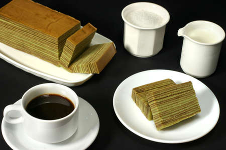 Coffee time with Indonesian spiced layered cakeの写真素材