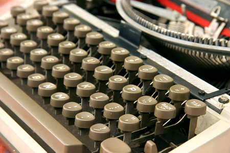 A vintage portable typewriter with ink ribbon