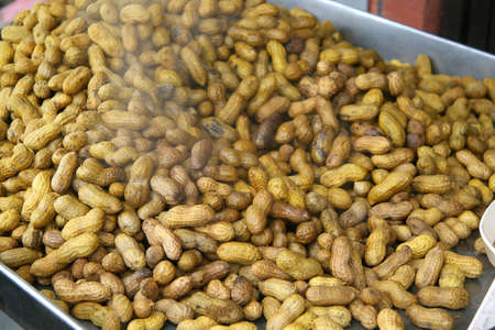 Steamed peanuts on a steaming tray at a highway stop