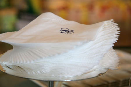 Stack of napkins arranged in spiral formationの写真素材