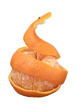 A mandarin with its peel lifted to show the fruit segments withinの写真素材