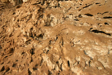 A highly textured and worn limestone wall in Ipoh Malaysia