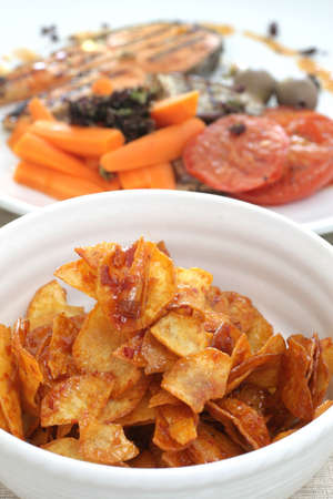 Exotic tapioca crisps rolled in sweet hot chili sauce in Malay styleの写真素材