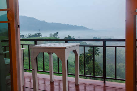 Chair on the porch for view fogのeditorial素材
