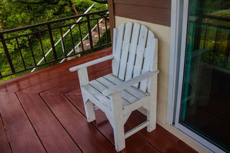 White chair on the brown porchのeditorial素材