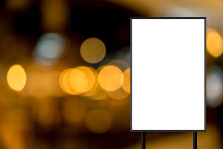mockup white poster with black frame stand in front of blur restaurant cafe background for show or present promotion product conceptの写真素材