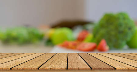 blur group of vegetable and fruit on table in the kitchen background with retro wood counter...
