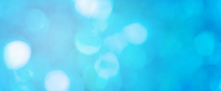 Abstract blue bokeh background.