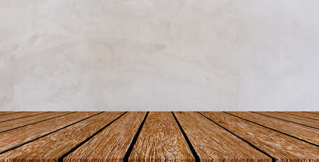 closeup building exterior gray retro cement wall background texture with old wood perspective counter for show,ads,design product on display conceptの写真素材
