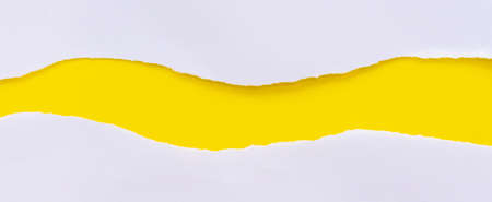 top view of white paper cover on yellow color paper horizontal panoramic background texture concept...