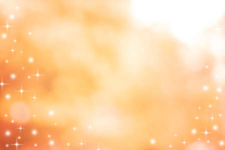 abstract blur orange and yellow color background with star glittering light for show,promote and advertisee product and content in thanksgiving and fall season collection conceptの写真素材