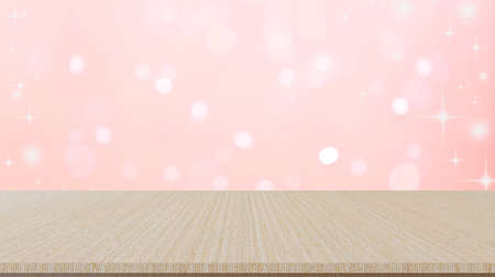 Wooden table top on pink bokeh light background. For product displayの写真素材