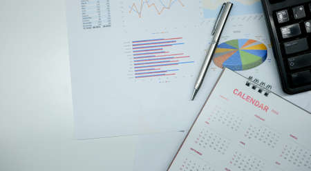 Calendar and pen on white background. Business and planning concept.の写真素材