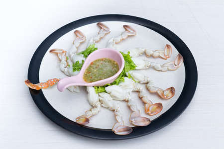 Boiled crabs claw fresh,Steamed crabs claw with seafood spicy sauce.の写真素材