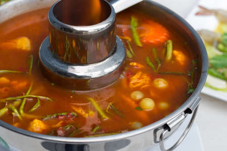 Roe of giant catfish in spicy sour soup.の写真素材