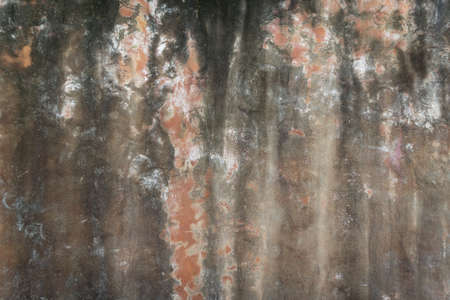 Dirty orange concrete wall.の写真素材