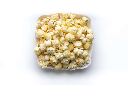 Popcorn in paper cup isolate on white background.の写真素材