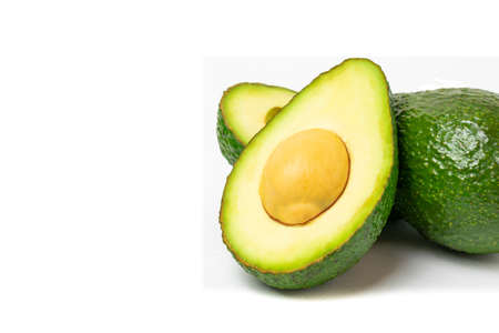 Half Avocado sliced isolated on white background.の写真素材