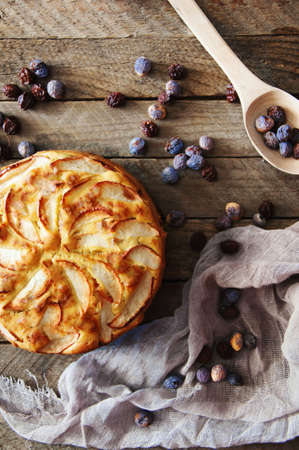 Delicious and beautiful apple pie on a wooden tableの写真素材